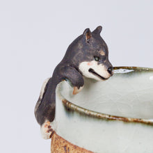 Load image into Gallery viewer, Yukurite - Ceramic sake cup with black shiba