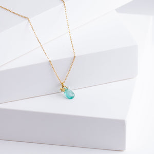 Emerald smiley necklace