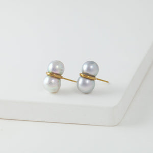 Large twin pearl earrings