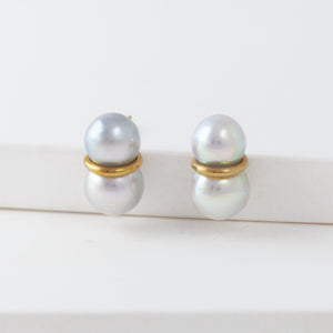 Large twin pearl earrings