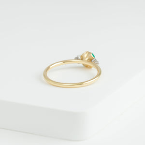 Enfold one-of-a-kind emerald and diamond ring