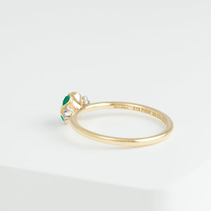 Enfold one-of-a-kind emerald and diamond ring