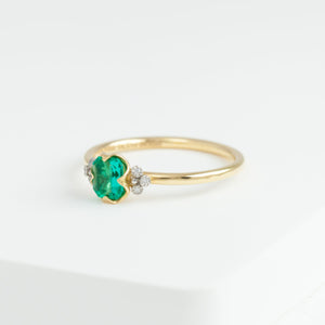 Enfold one-of-a-kind emerald and diamond ring