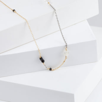 Mixed metal chain necklace with monotone gemstones