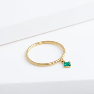 Swinging square emerald ring