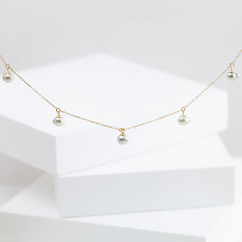 Baby Akoya pearl station necklace