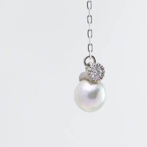 Baby Akoya pearl single pearl diamond drop platinum earrings