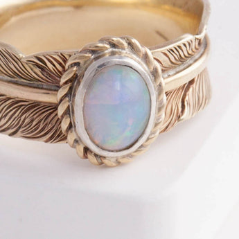 Gold large infinity feather ring with Ethiopian opal