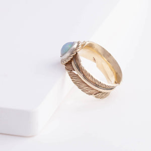 Gold large infinity feather ring with Ethiopian opal