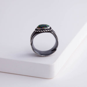 Oxidized silver large infinity feather ring with Kyocera opal