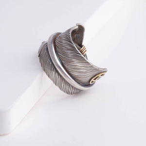 Oxidized silver large feather ring with logo