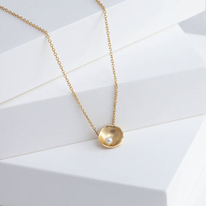 Gold petal necklace with pearl