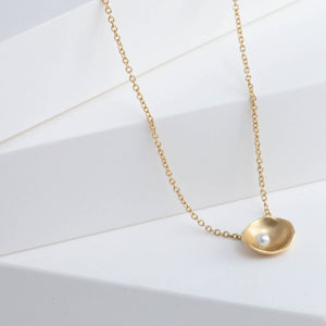 Gold petal necklace with pearl